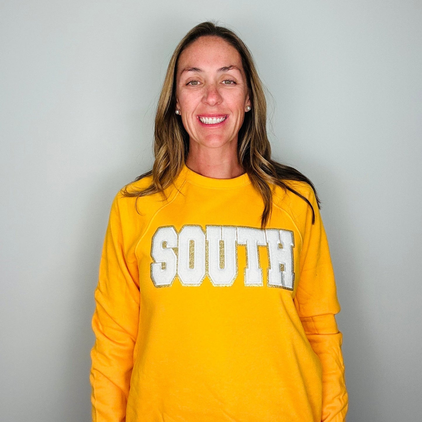 South Chenille Patch on a Yellow Unisex Crewneck