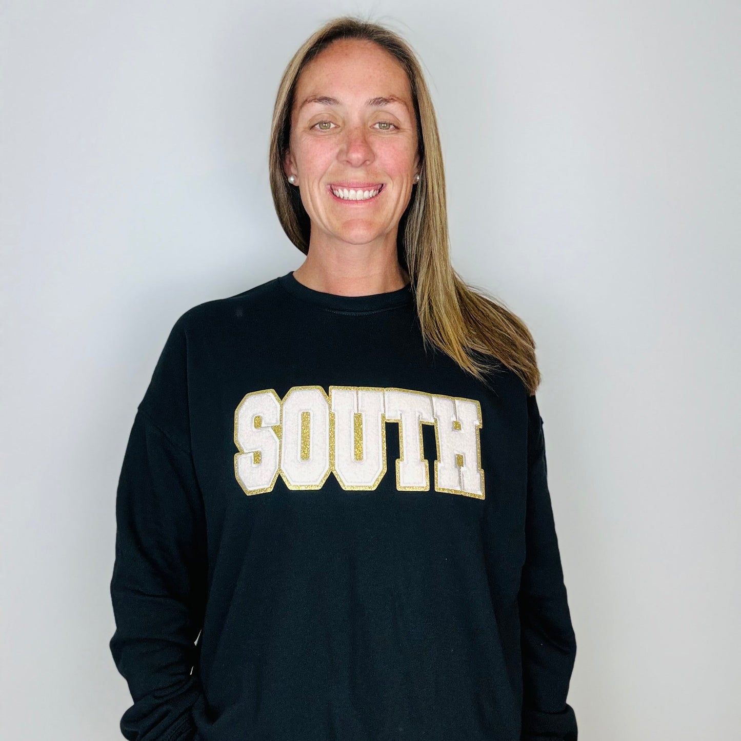 South Chenille Patch on a Black Unisex Crewneck