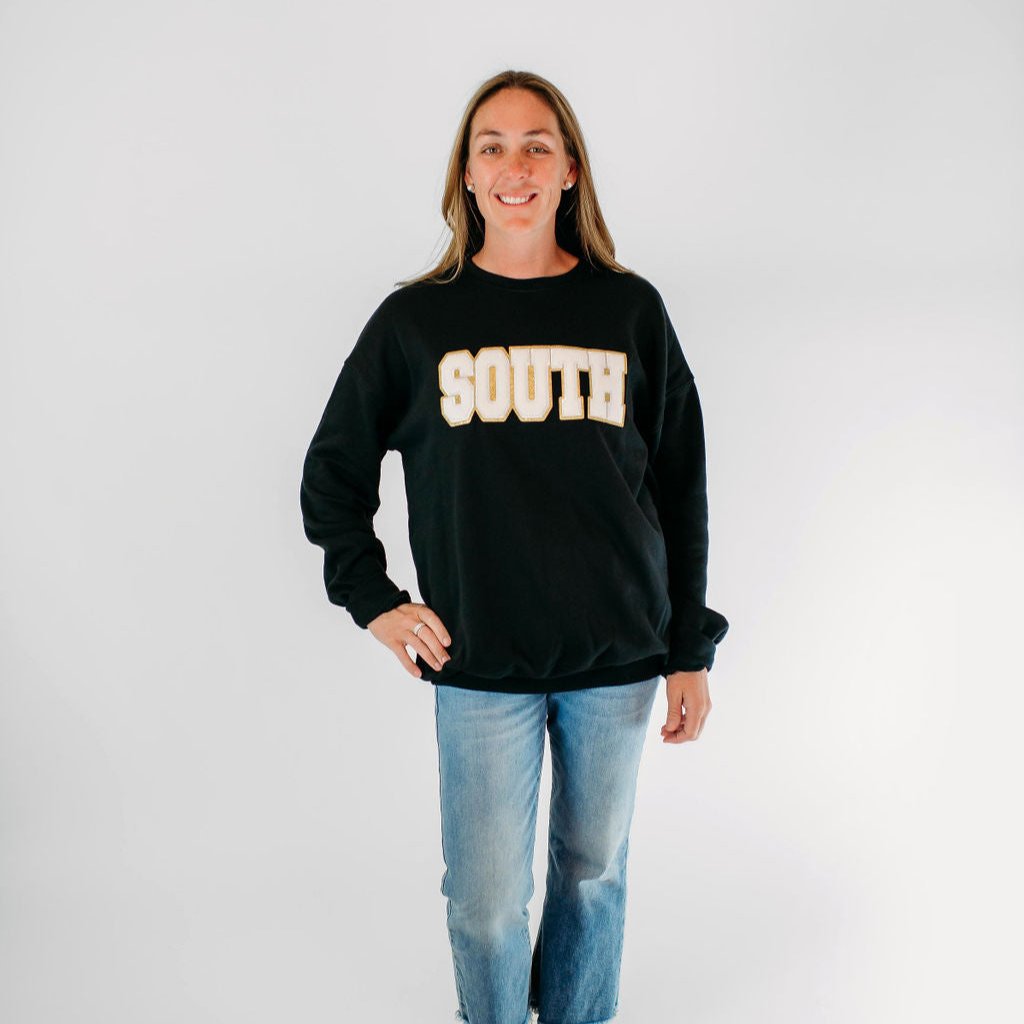 South Chenille Patch on a Black Unisex Crewneck