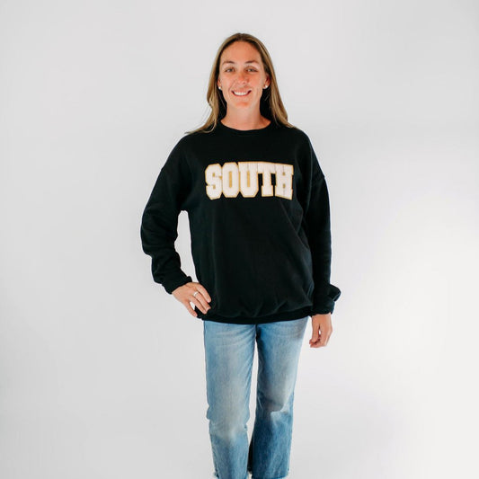 South Chenille Patch on a Black Unisex Crewneck