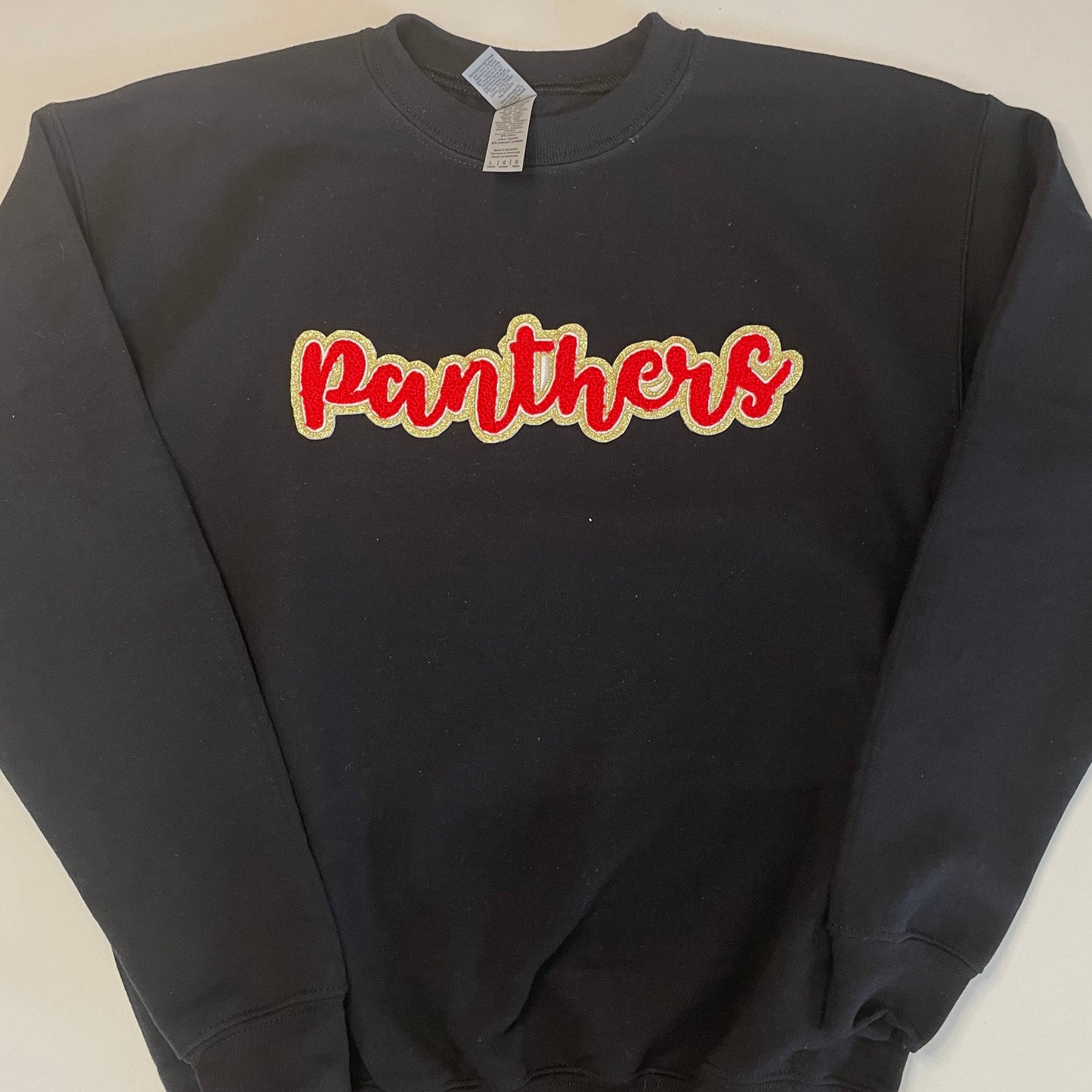 Panthers Chenille Patch in a Youth Crewneck